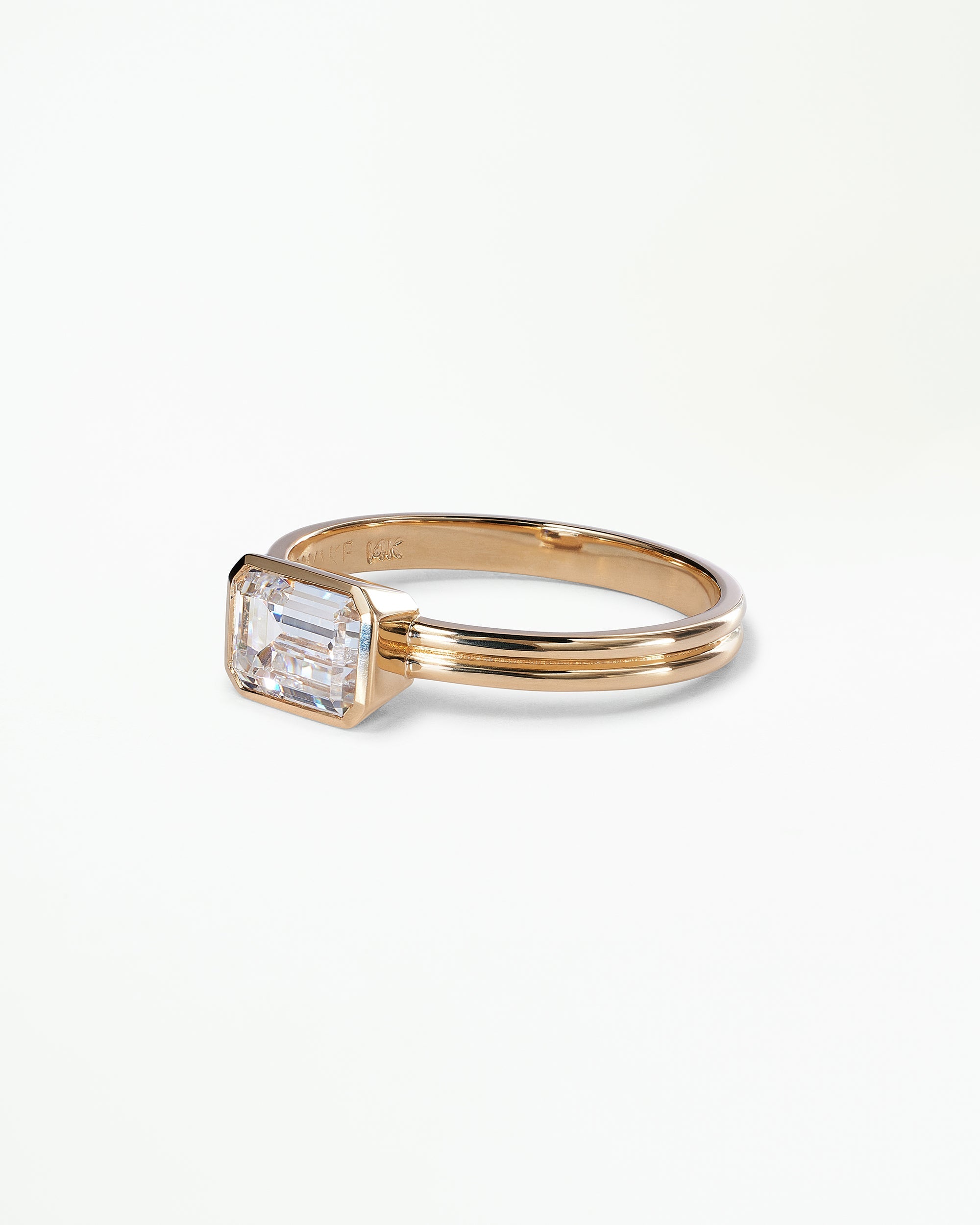 [lifestyle]Emerald Cut Diamond Ridge Solitaire Ring