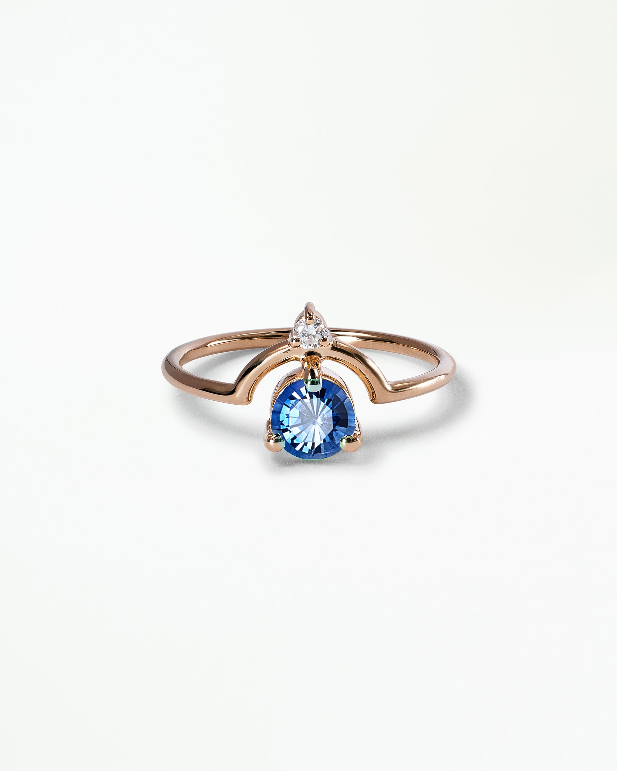 Medium Round Cut Sapphire and Diamond Nestled Ring