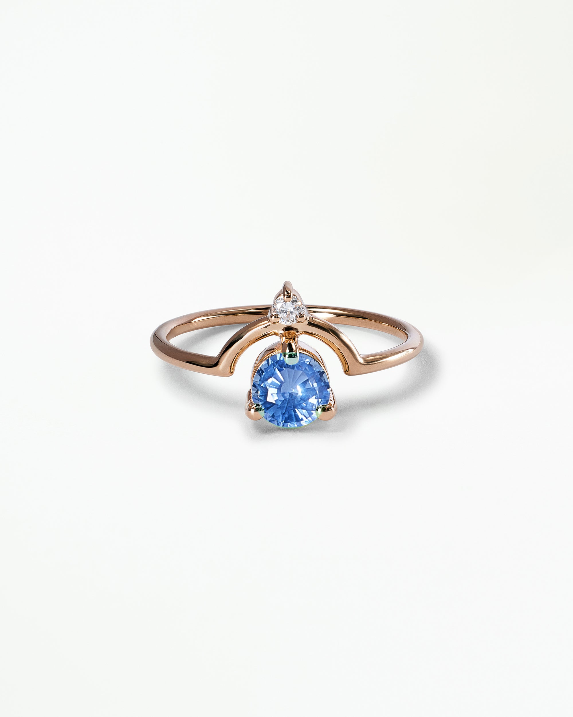 Medium Round Cut Sapphire and Diamond Nestled Ring