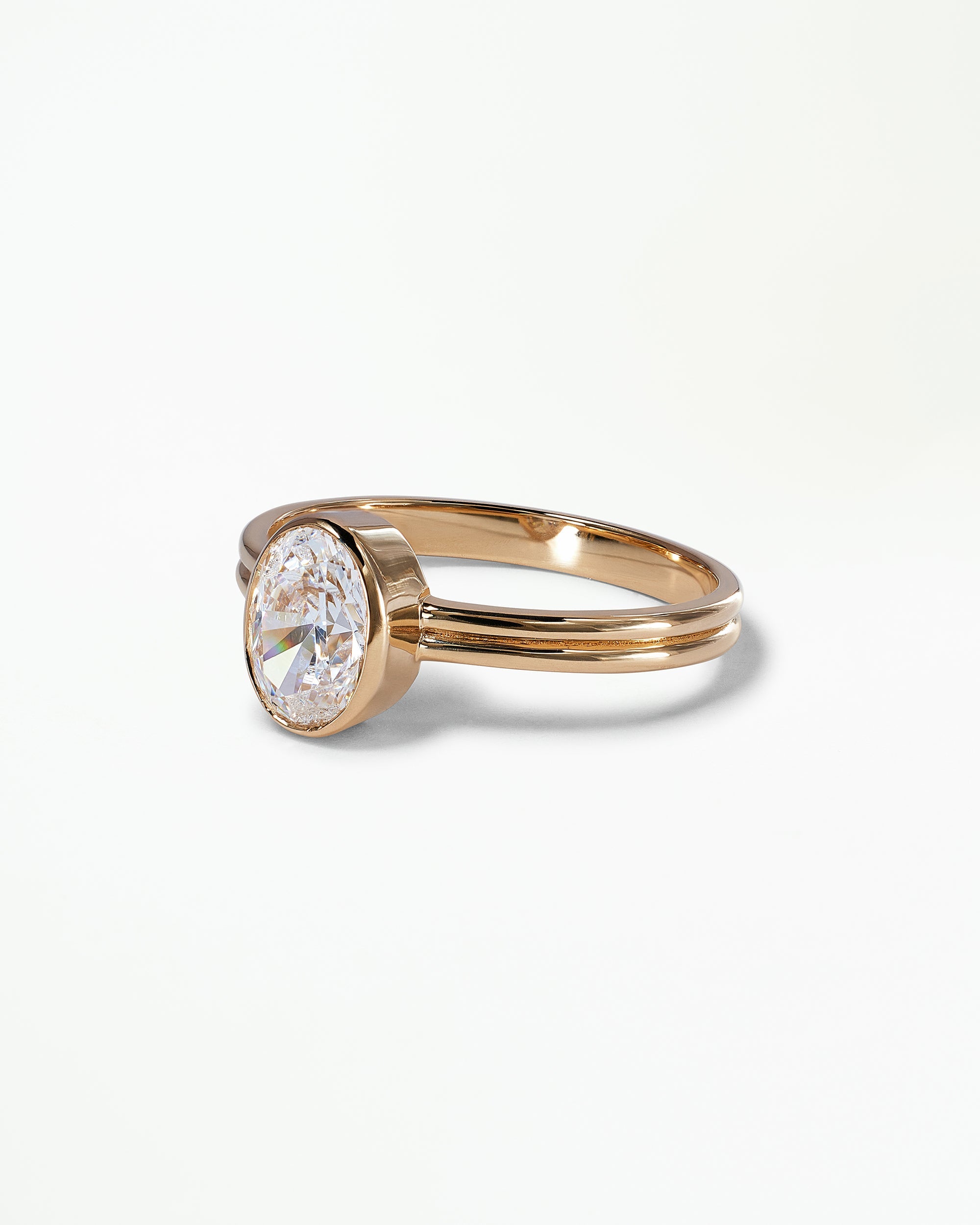 [lifestyle]Oval Brilliant Cut Diamond Ridge Solitaire Ring