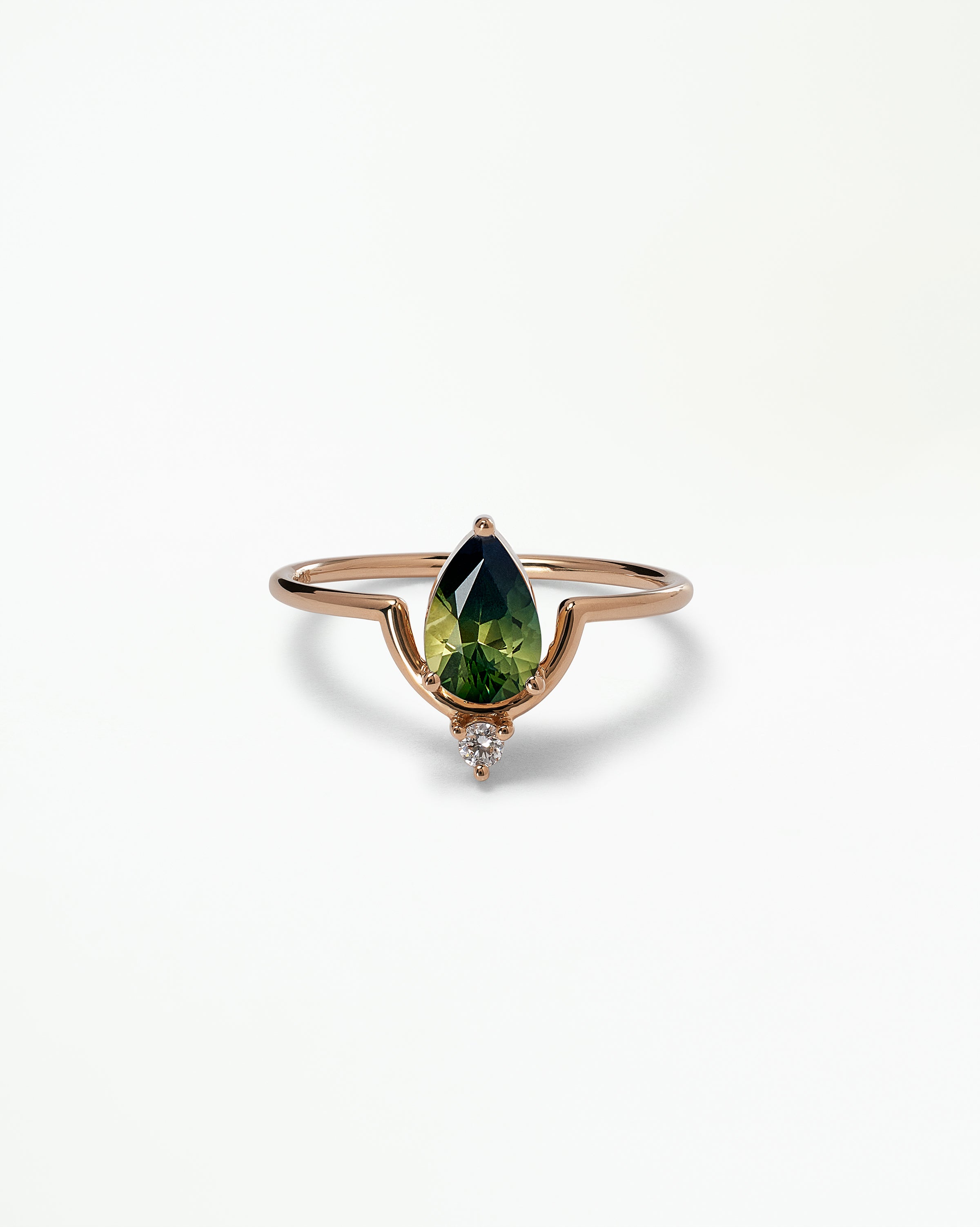 Pear Cut Sapphire Nestled Ring