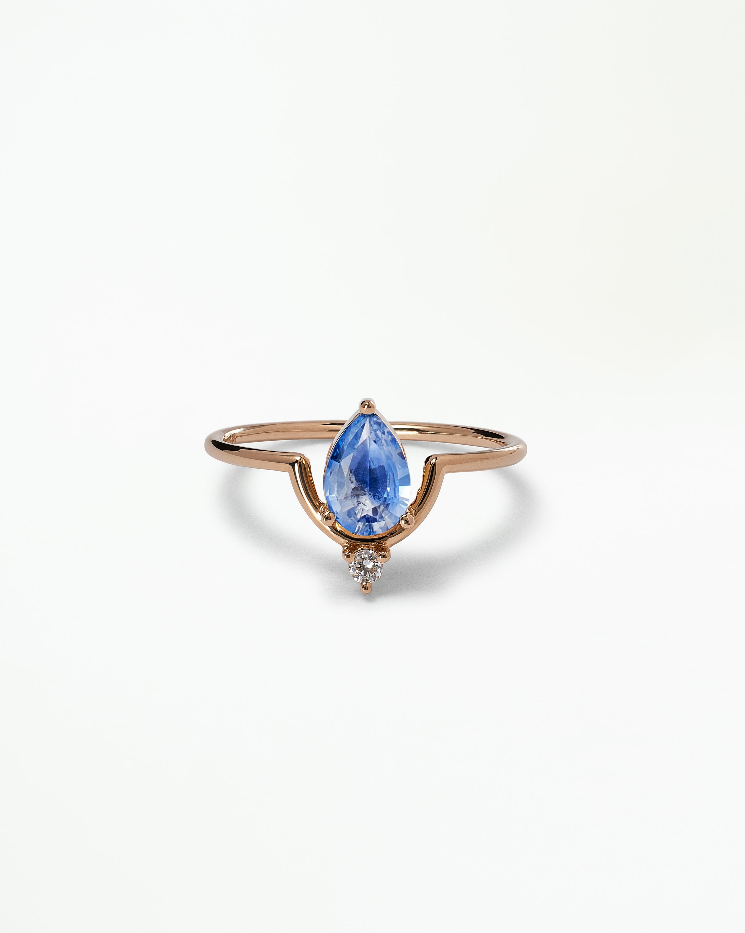 Pear Cut Sapphire Nestled Ring