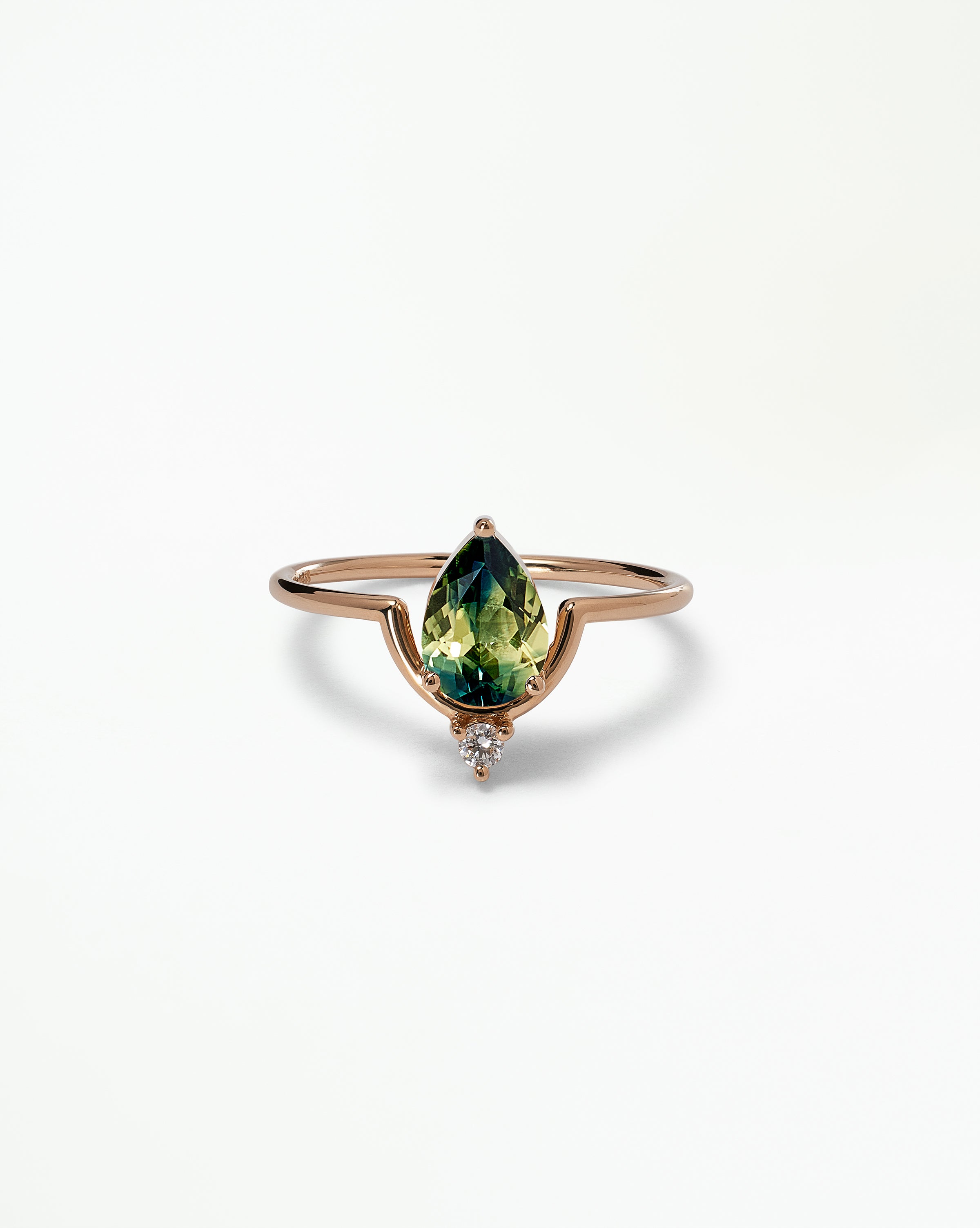 Pear Cut Sapphire Nestled Ring